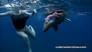 Nastya plus Masha are swimming nude in the sea